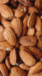 Closeup of several raw almonds